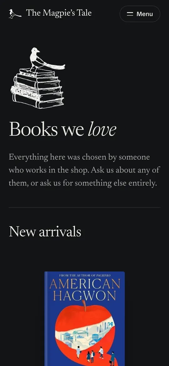 The Books page in dark mode, a magpie standing on a pile of books